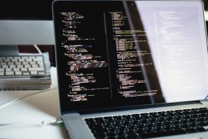 web development, writing js code, office, laptop
